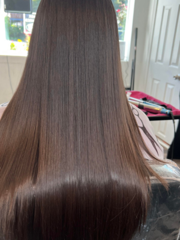 Client’s hair after a keratin treatment at Wendy Beauty Salon, featuring silky-smooth and shiny locks