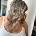 Creating Sun-Kissed Waves: A Tale of Highlights, Balayage, and Redken Shades EQ